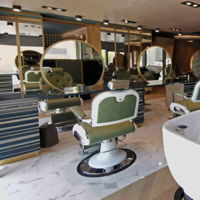 A trendy beauty salon showcases innovative hair and makeup techniques.