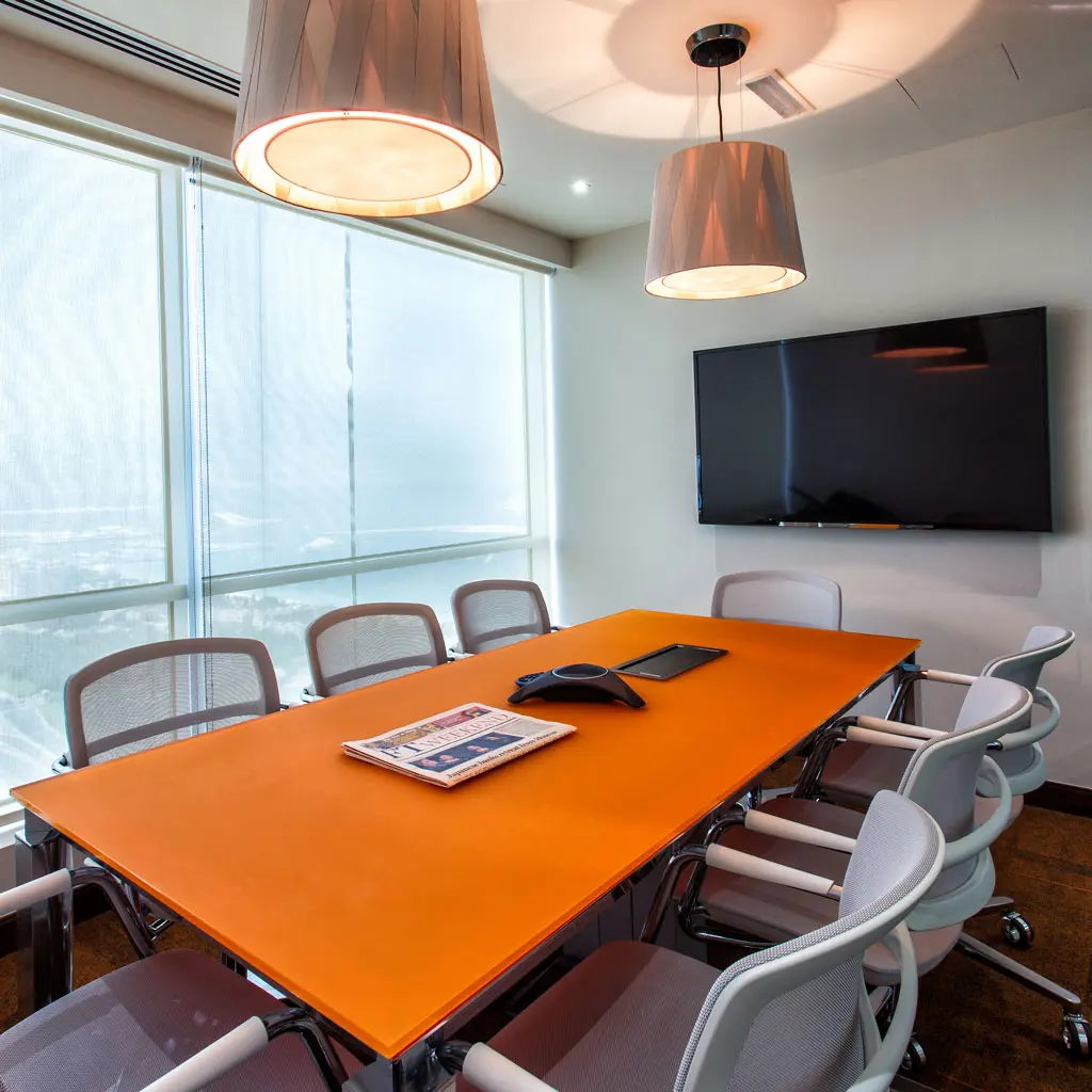 A compact meeting room for a team of 8 for a tech company office in Dubai
