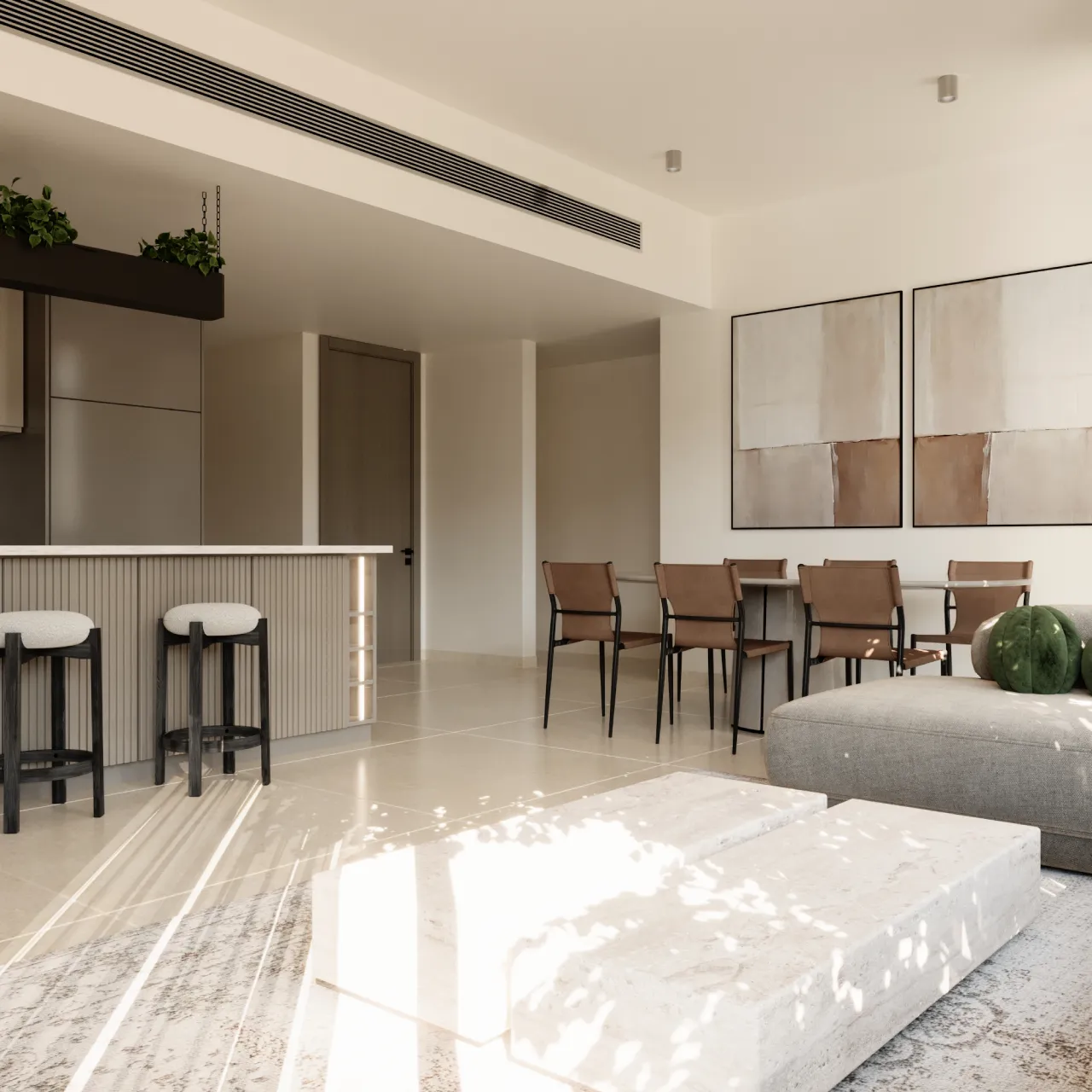 apartment living room with fluted kitchen counter, bar stools, dining area, abstract artwork, beige rounded sofa